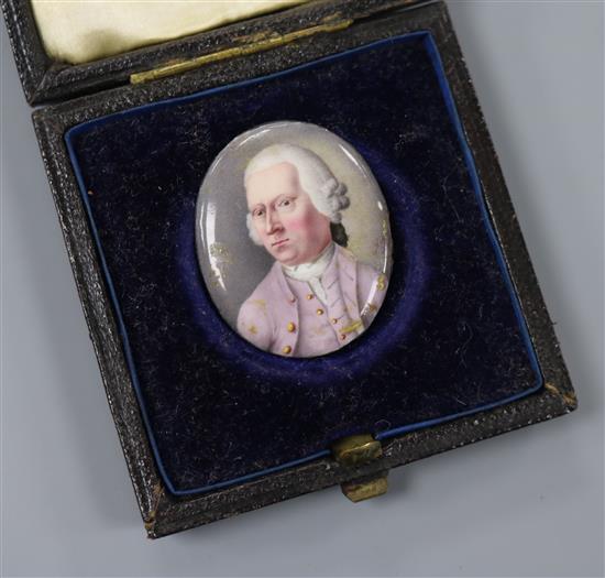 An 18th century enamel miniature of a gentleman wearing a lilac coat 3.5 x 2.75cm, unframed